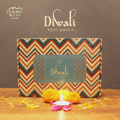 Jammu Nuts Diwali gift pack with decorative elements on a wooden surface